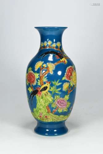 The peacock blue glaze add carved flowers and birds lines to...