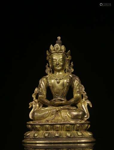 Copper and gold Buddha furnishing articlesSize: 10.7 cm high...