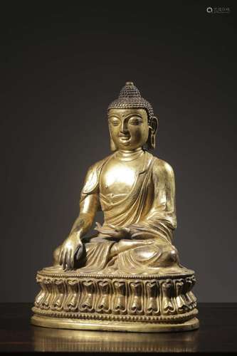 Copper and gold Buddha had caveSize: 24.3 cm high, 17 cm lon...