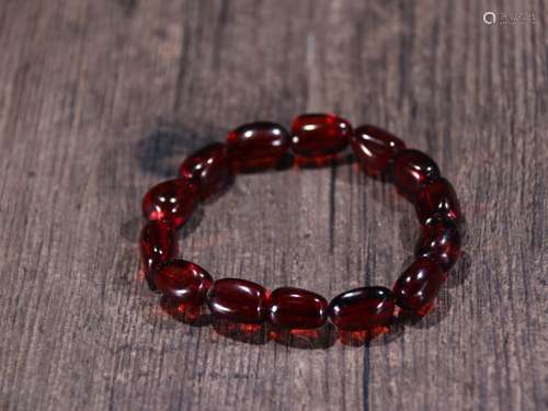 Blood amber barrel bead string.Specification: 1.57 * 1.05 cm...