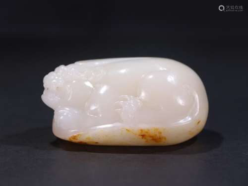 Hetian jade seed expects the mythical wild animal jade piece...