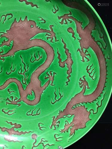 Dark green glaze carved dragon plate,