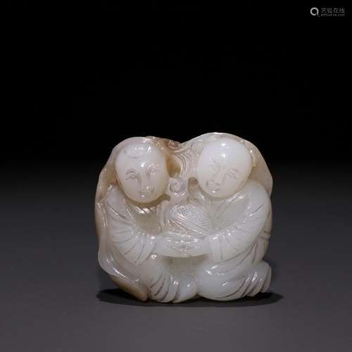 Hetian jade and the lad.Specification: 4.1 cm high 4.4 cm wi...