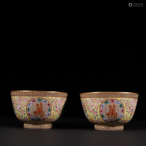 A pair of gold yellow to enamel stays in bowl.Specification:...