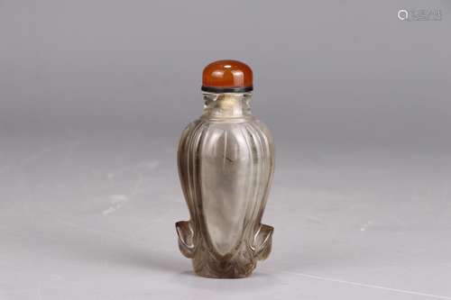 The crystal snuff bottle4 cm long, 3 cm wide, 8 cm tall, wei...