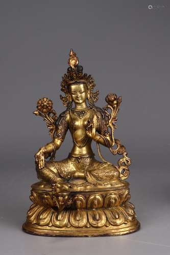 : copper and gold tara's statue14 cm long and 10 cm wide...