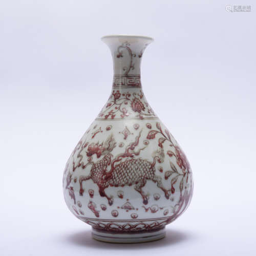 A copper-red-glazed 'unicorn' pear-shaped vase