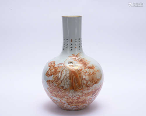 An allite red glazed globular vase