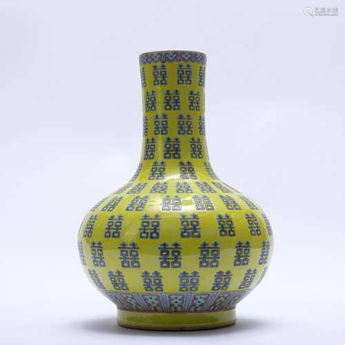 A yellow glazed vase