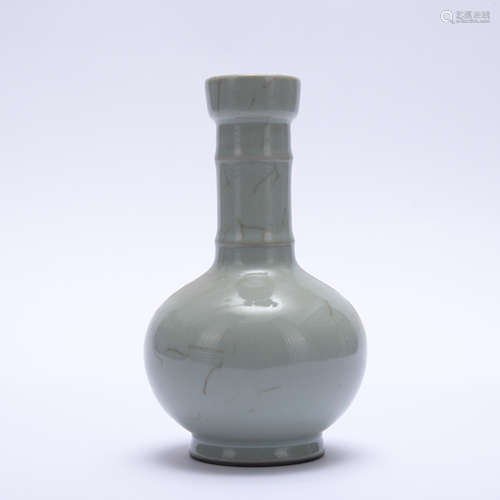 A celadon-glazed vase