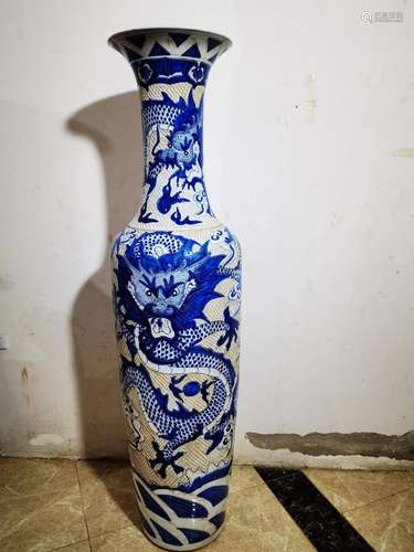 A pair of blue and white big bottle