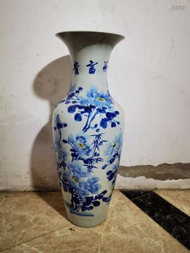 A pair of blue and white big bottle