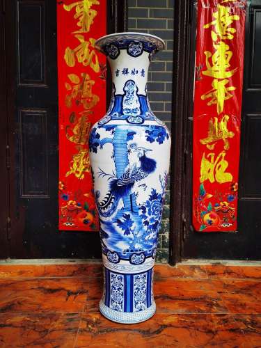 A pair of blue and white big bottle