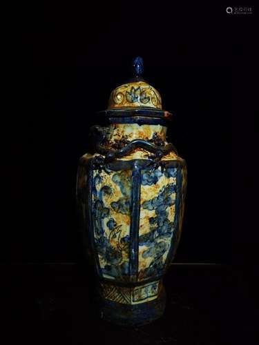 Blue and white embossed bottle