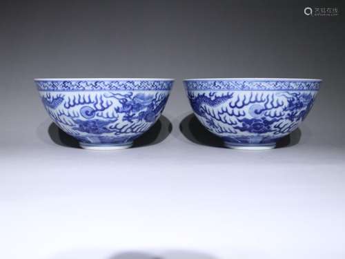 A pair of blue and white dragon bowl - 17 cm high 8.4 cm dia...