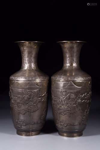 : a pair of silver carve engraves landscape characters of th...