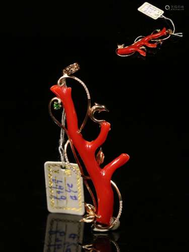 Taiwan. Aqua red coral branch with 18 k gold pendantSize: 6....