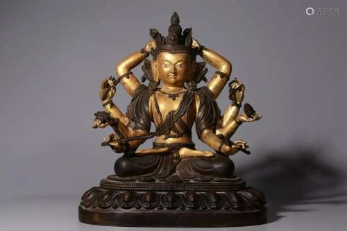 In the Qing Dynasty, the bronze and gold seated statue of Zh...