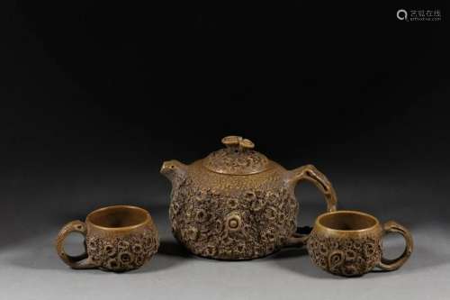 In the Qing Dynasty, a set of tree pattern purple sand tea s...