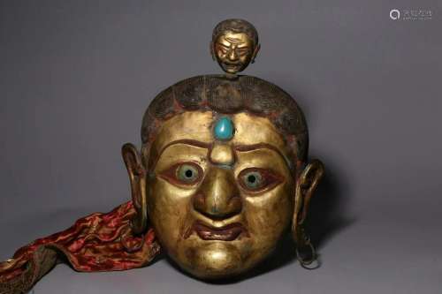 In the Qing Dynasty, bronze gilded mage mask