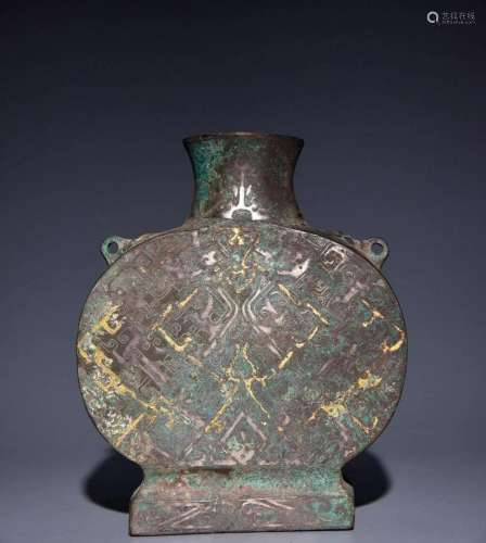 In ancient China, a flat bottle with gold and silver ears wa...