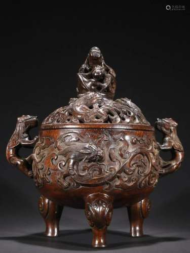 In the Qing Dynasty, the incense burner carved with dragon m...