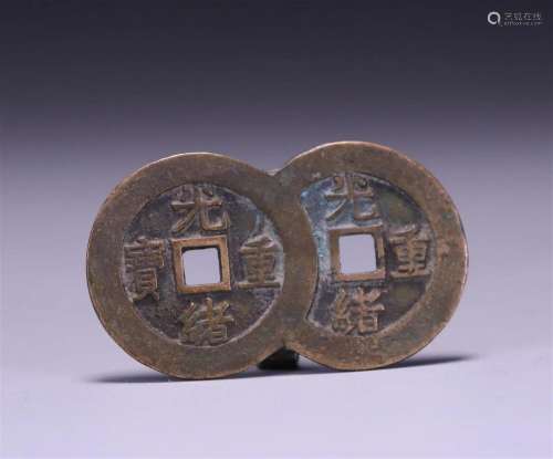 In the Qing Dynasty, Guangxu's precious conjoined copper...