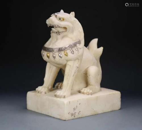 In ancient China, white jade and stone lion ornaments with g...