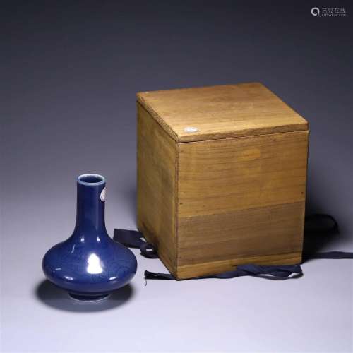 In the Qing Dynasty, the blue glaze bottle with dark dragon ...