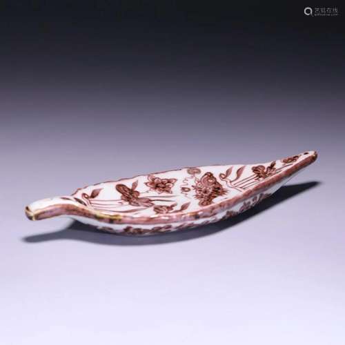 In the Ming Dynasty, underglaze red leaf-shaped pen licked