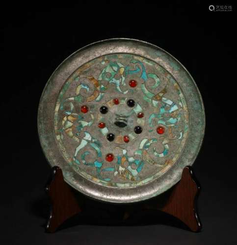 In ancient China, copper tire was inlaid with green pine rou...