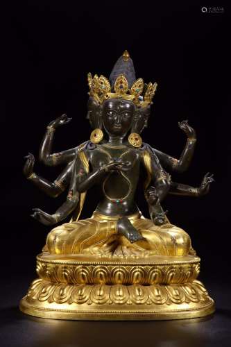 : "worship" in copper and gold statue of mother Bu...
