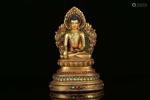 Copper and gold medicine guru Buddha, this statue of medicin...