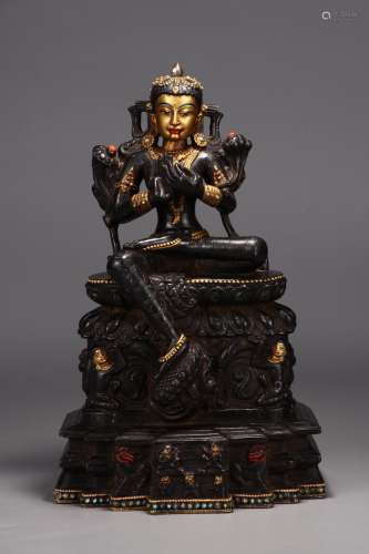 Blackstone: gold tara's statue18.5 cm long and 13 cm wid...