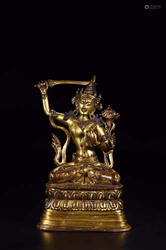 : copper and gold manjusri bodhisattva's statueTo grow b...