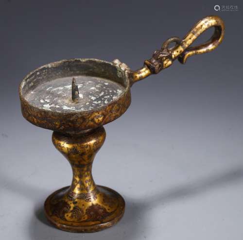 , copper candlestick of gold or silverSize, 14.3 cm long and...