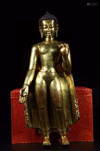copper and gold Buddha stands resembleSize13 cm long and 24....