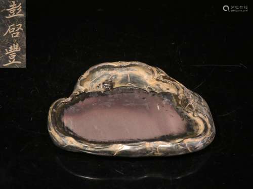 ."Peng Qifeng hand-carved lotus leaf form old ink stone...