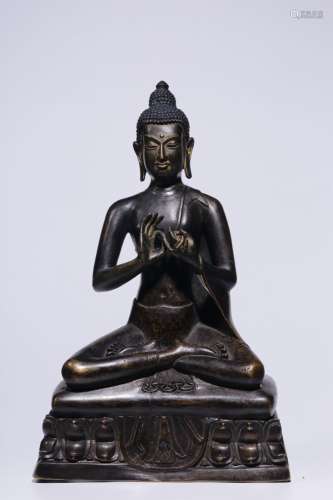 The copper Buddha statue32 cm high, 20 cm long and 10 cm wid...