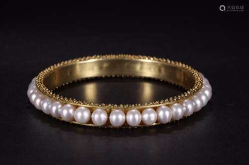 The gold: silver eastern pearl braceletSize: 9 cm inner diam...