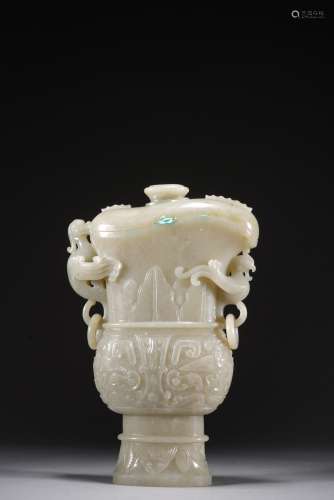 QIN DYNASTY, WHITE JADE CUP WITH ANIMAL FACE PATTERN