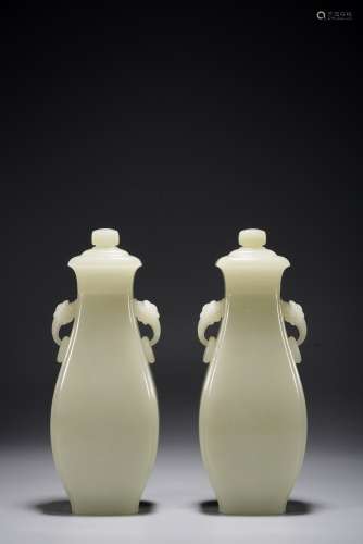 QIN DYNASTY, A PAIR OF WHITE JADE DOUBLE-RING EAR VASES