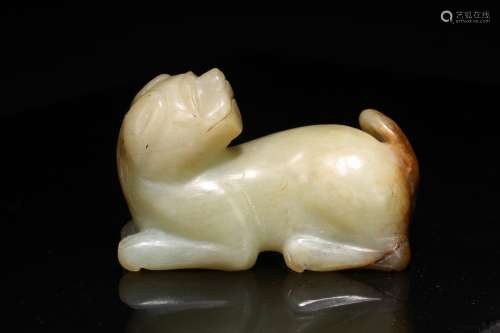 A CHINESE WHITE JADE CARVED DOG