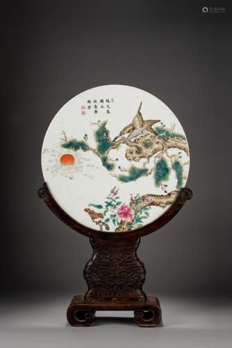 A FAMILLE ROSE 'EAGLE AND PINES' CIRCULAR PANEL SCREEN
