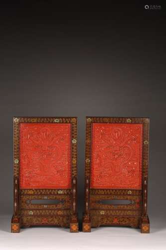 A PAIR OF LARGE CINNABAR LACQUER TABLE SCREENS