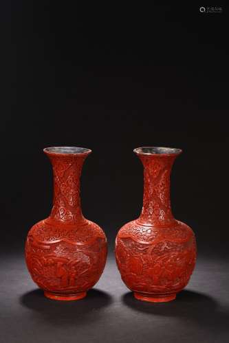 A PAIR OF CINNABAR LACQUER FIGURES BOTTLE VASES