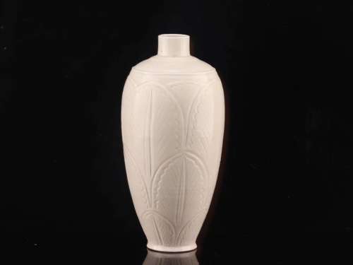 carved porcelain vaseSize: 30.3 cm diameter 4.4 cm bottom di...