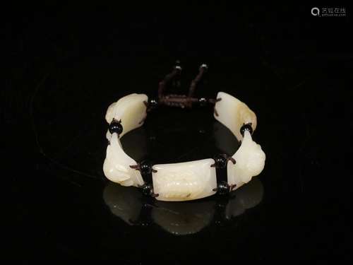 Hetian jade hand stringSize: single thick 1.3 cm, 2.7 cm lon...