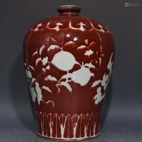 The red and white 34.5 x25 sanduo grain mei bottle