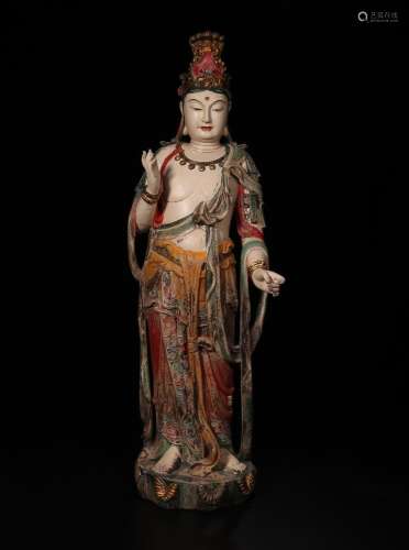 : old camphor wood painted "guanyin" like a statue...
